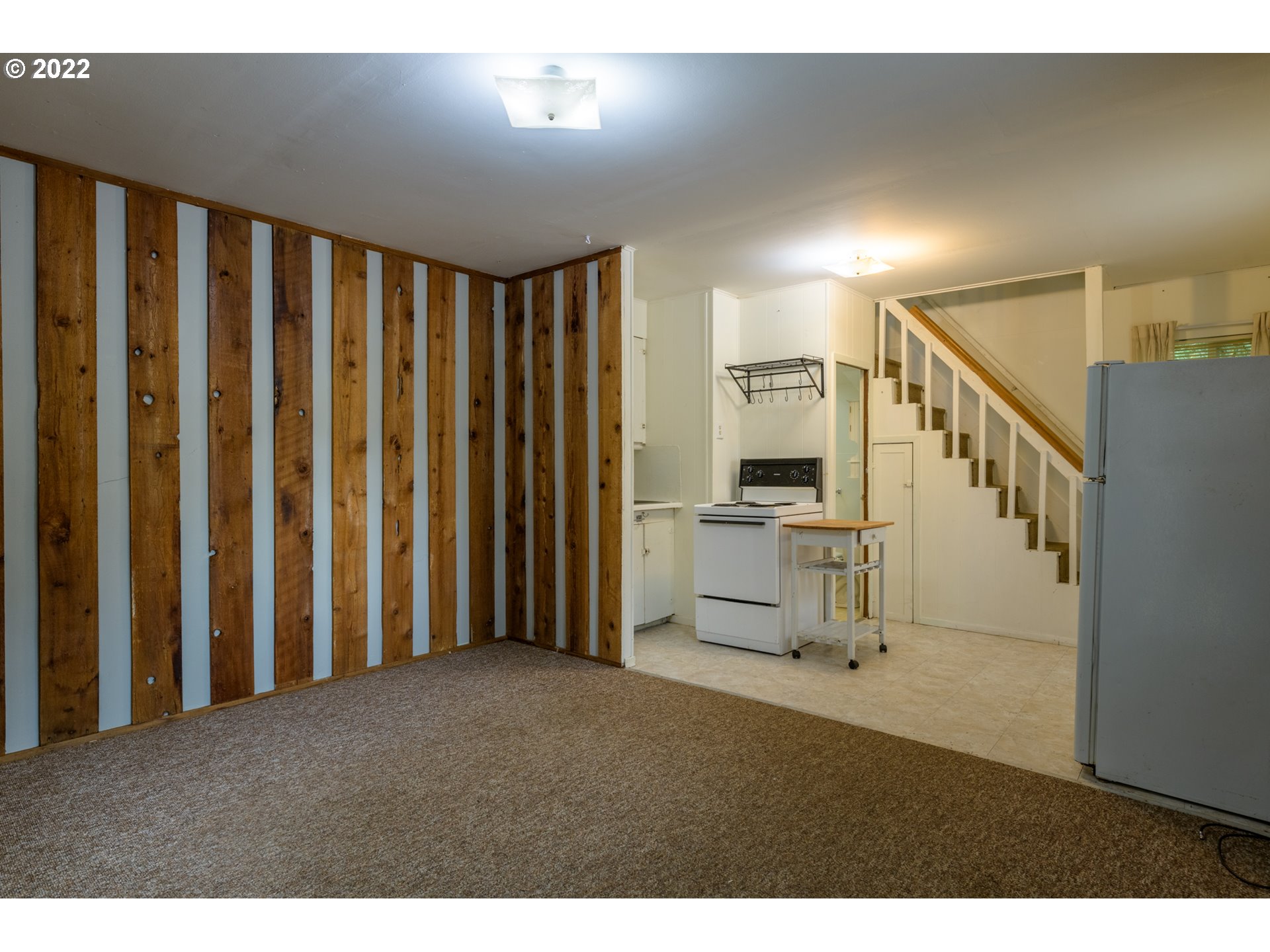 69947 East E Highway, Unit 5 Rhododendron, OR 97049 - Photo 18 of 31 a view of a hallway with stairs