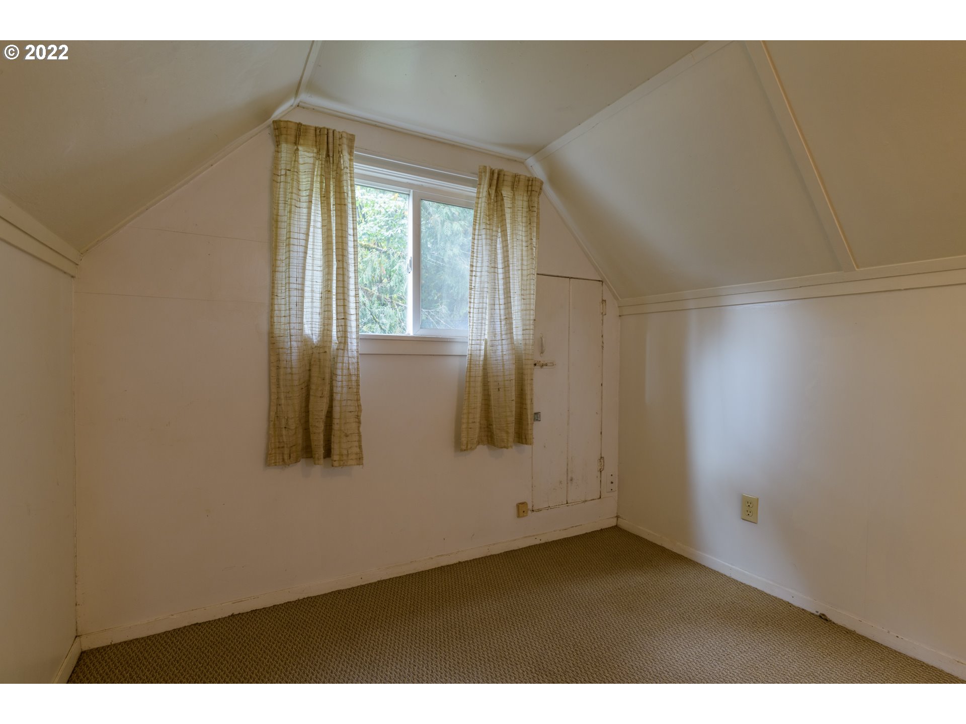 69947 East E Highway, Unit 5 Rhododendron, OR 97049 - Photo 27 of 31 a view of an empty room with a window