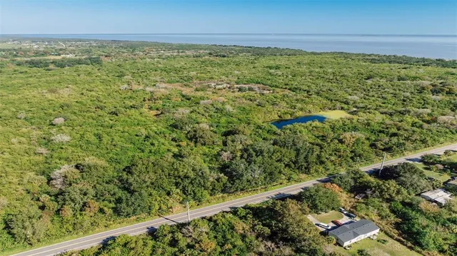 a view of a yard with an outdoor space
