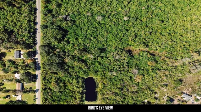 a view of outdoor space and a yard