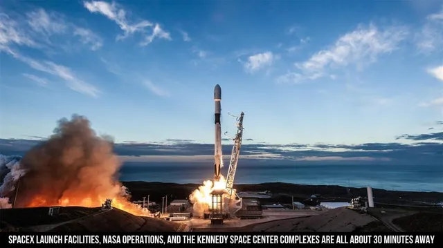 a view of water with boats and trees in the background