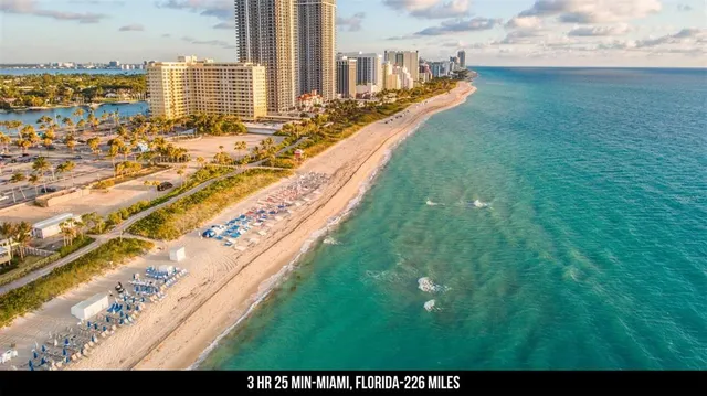 a bathroom with a shower and a sink