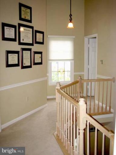 311 Ridgepoint Place Gaithersburg, MD 20878 - Photo 11 of 30 Upper level landing w/dramatic high ceiling