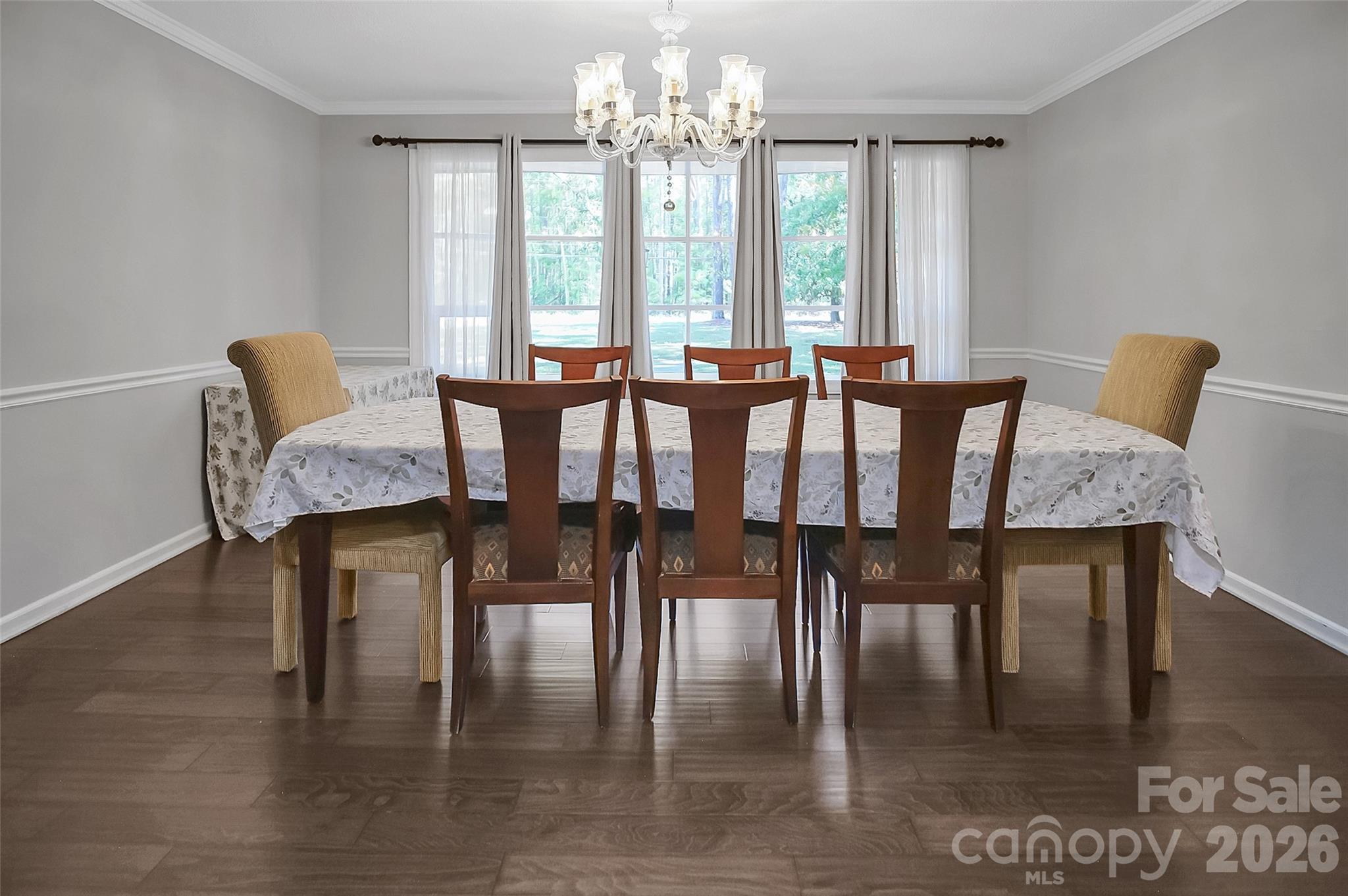 808 Old Mt Holly Road Stanley, NC 28164 - Photo 33 of 48 a view of a dining room with furniture window and wooden floor