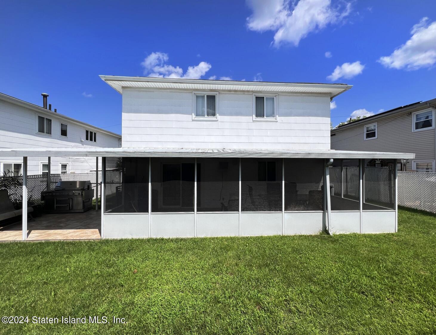 28 Gary Place Staten Island, NY 10314 - Photo 23 of 28 a view of a house with a garden