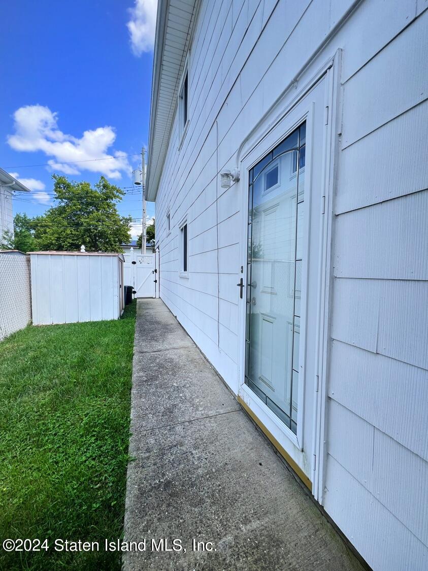 28 Gary Place Staten Island, NY 10314 - Photo 24 of 28 a view of a back yard of the house