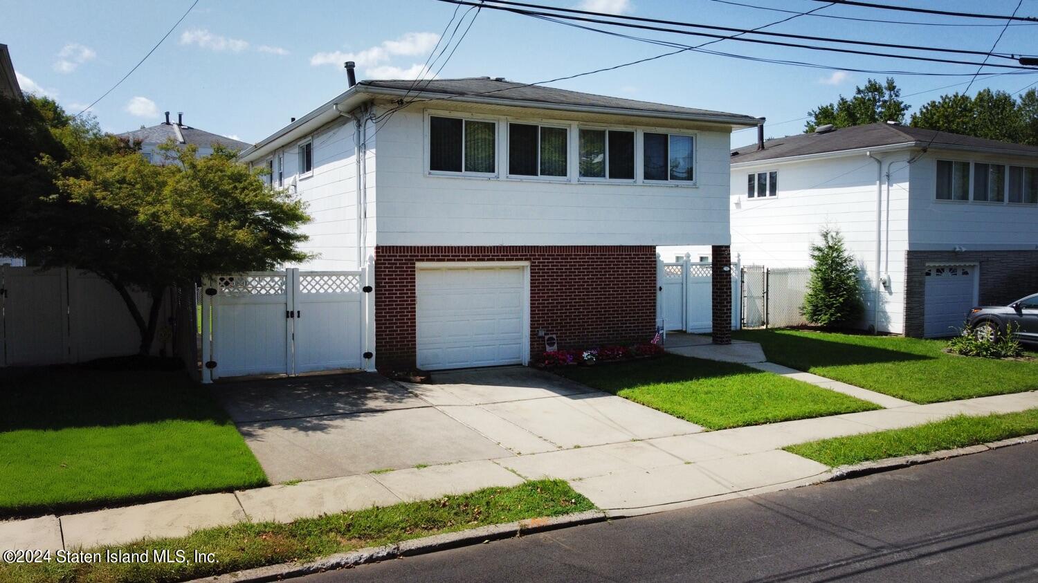 28 Gary Place Staten Island, NY 10314 - Photo 28 of 28 a view of a house with a yard