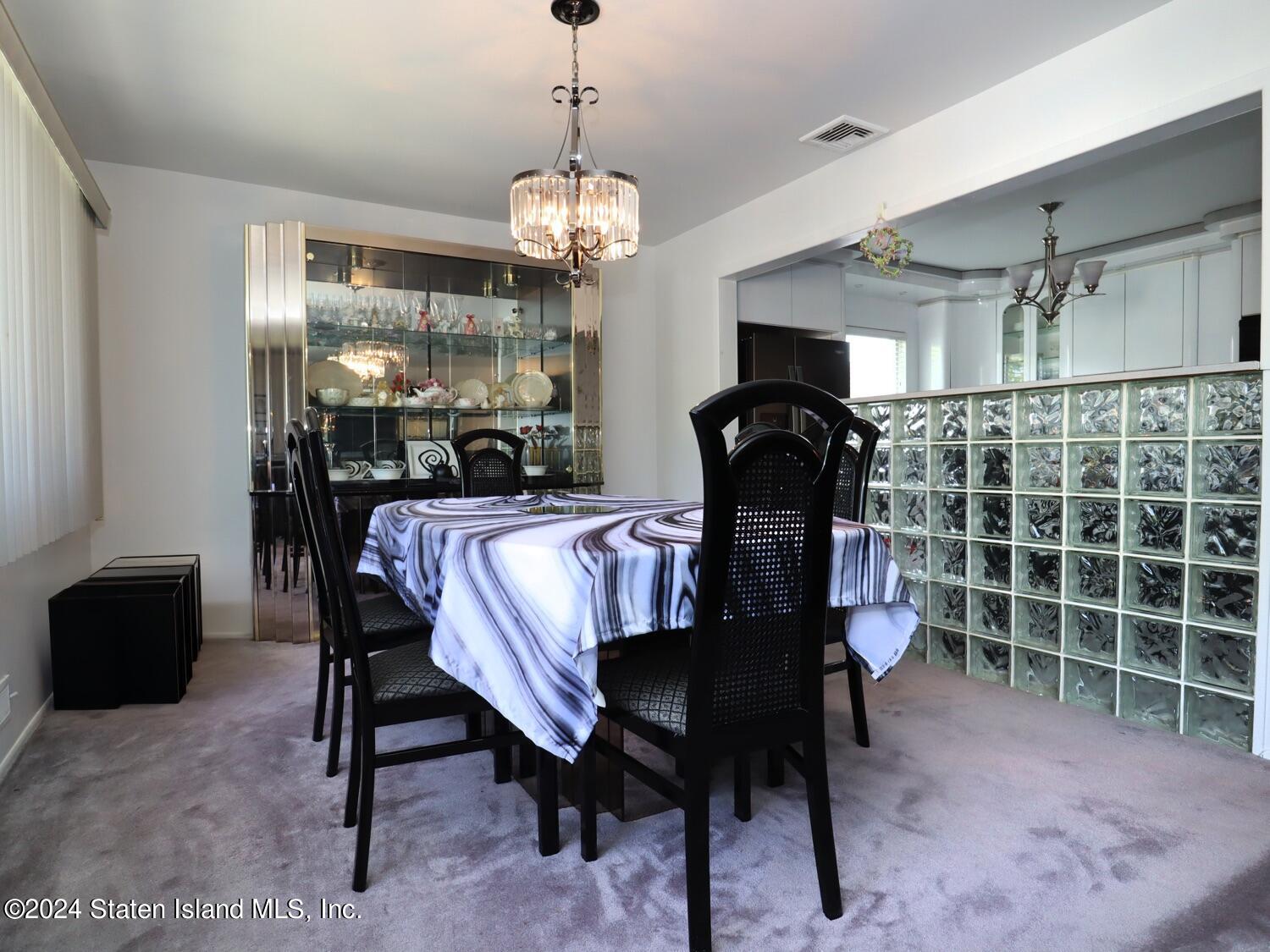 28 Gary Place Staten Island, NY 10314 - Photo 7 of 28 a view of a dining room with furniture