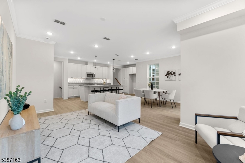 221 Myrtle Road Warren, NJ 07059 - Photo 12 of 37 a living room with furniture and a potted plant