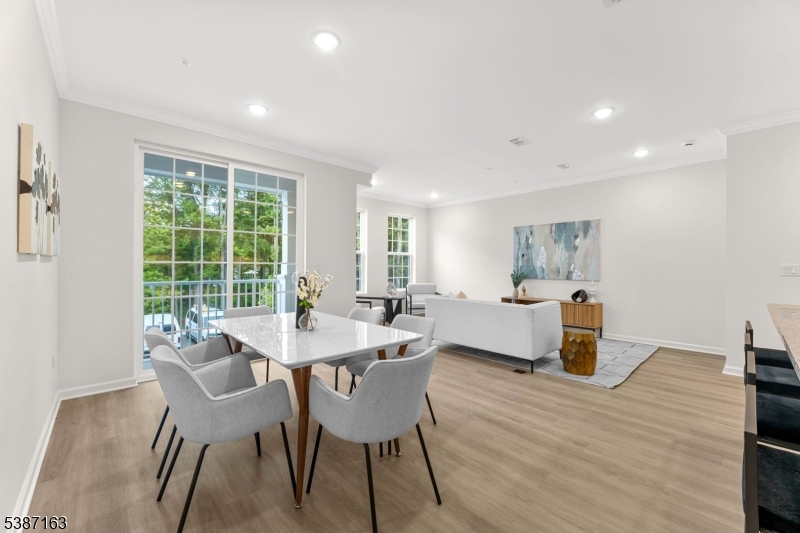 221 Myrtle Road Warren, NJ 07059 - Photo 13 of 37 a dining room with furniture and wooden floor