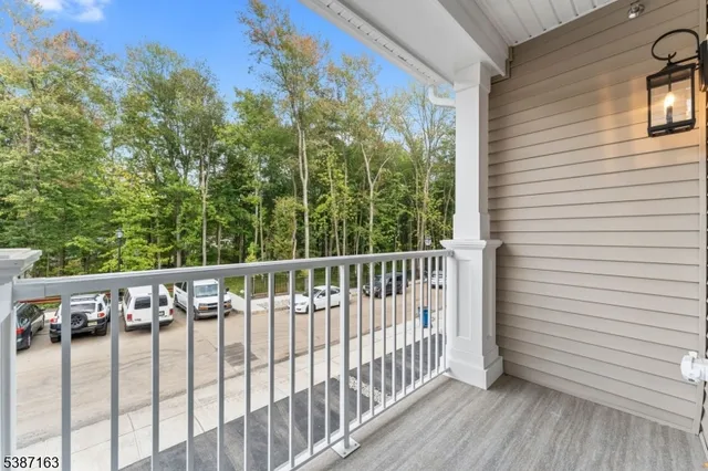 a bathroom with a sink a mirror and a shower