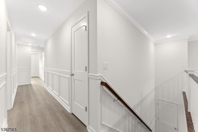 221 Myrtle Road Warren, NJ 07059 - Photo 17 of 37 a view of a hallway with wooden floor