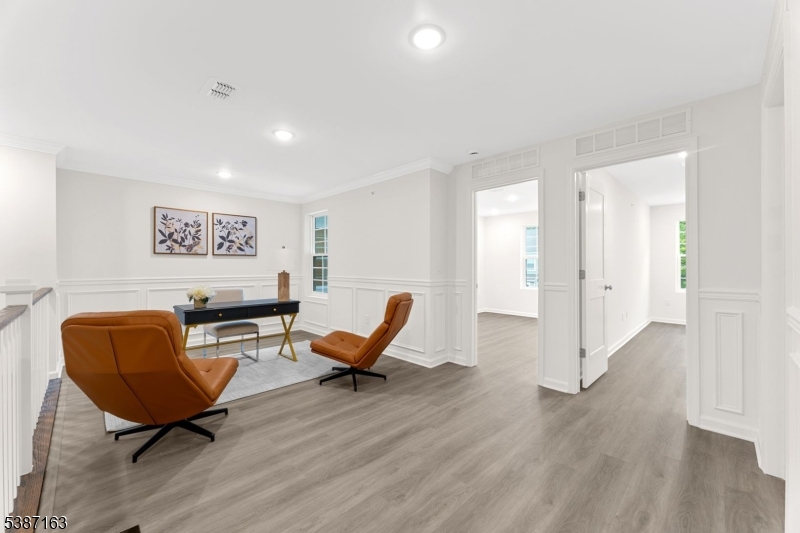 221 Myrtle Road Warren, NJ 07059 - Photo 18 of 37 a workspace with furniture and wooden floor