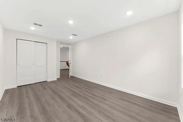 a bathroom with a sink vanity and a mirror