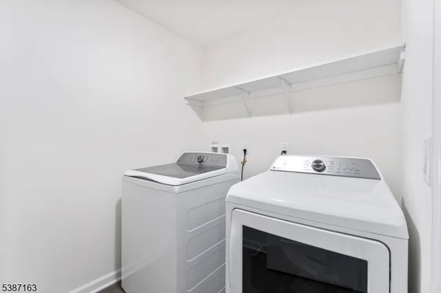 a front view of a building with a lot of windows