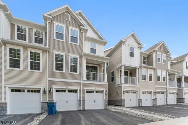 a front view of a building with a street