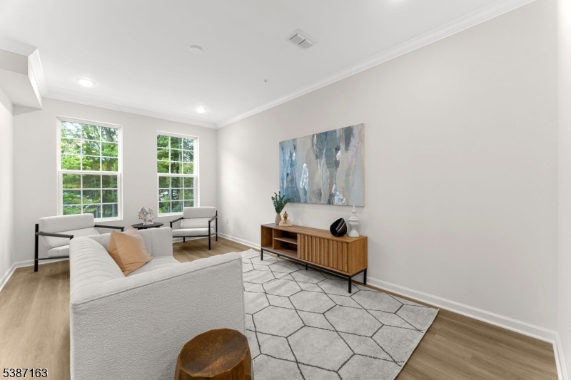 221 Myrtle Road Warren, NJ 07059 - Photo 10 of 37 a living room with furniture and a large window