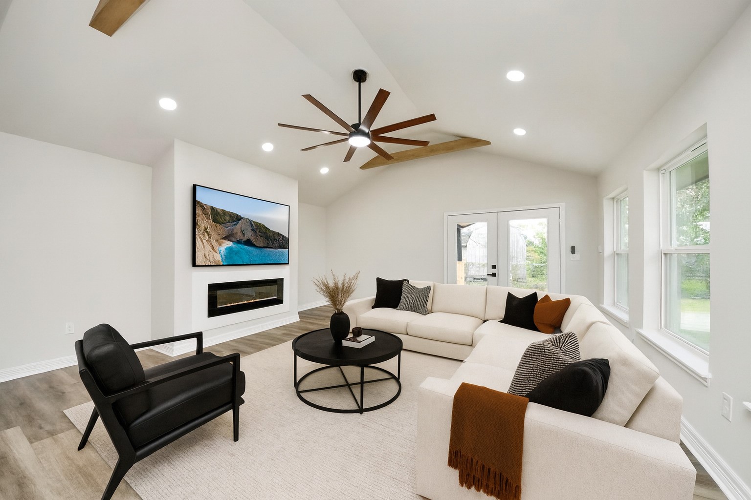 4311 Goldfinch Street Houston, TX 77035 - Photo 2 of 40 a living room with furniture and a large window with wooden floor