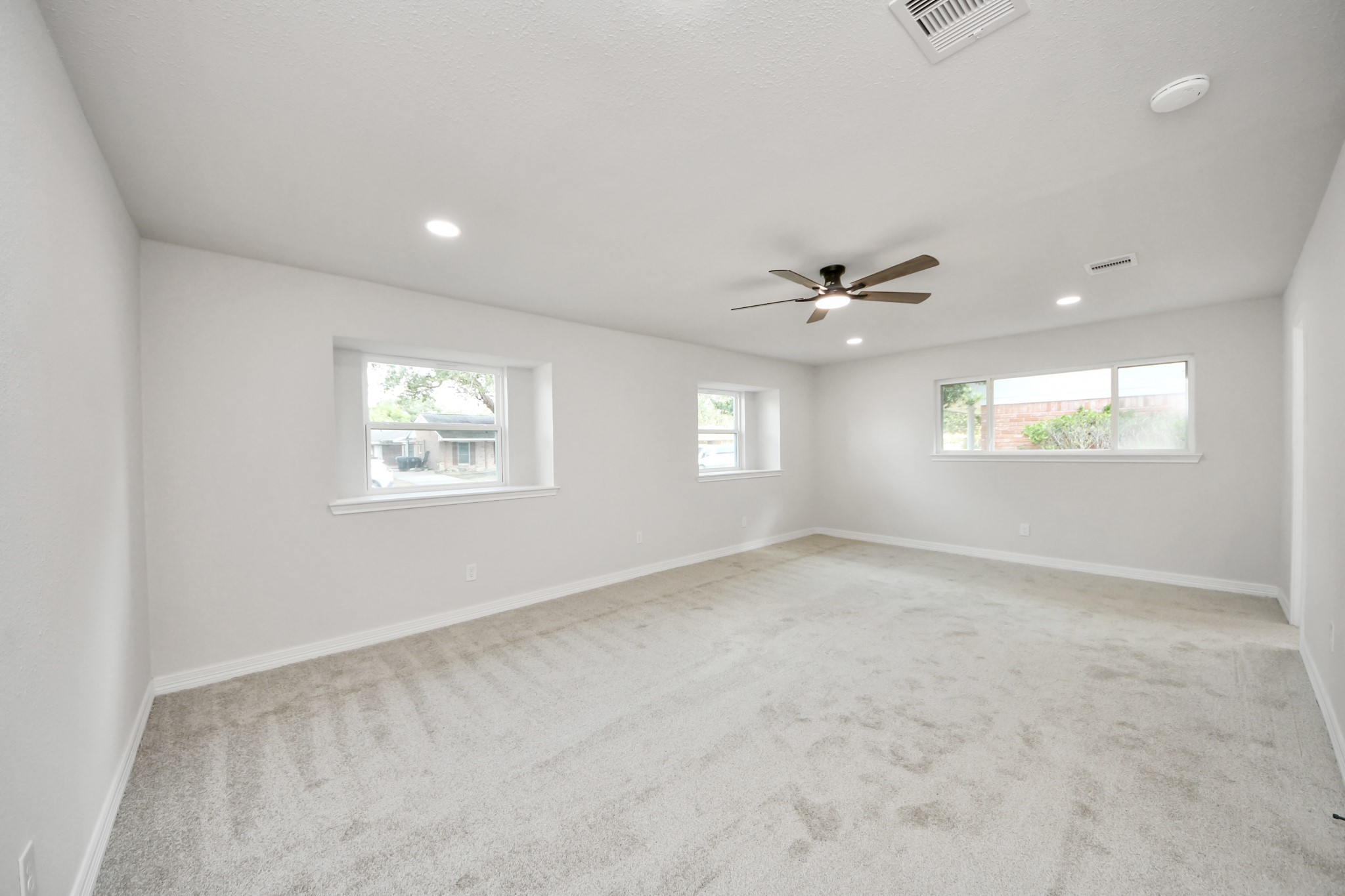 4311 Goldfinch Street Houston, TX 77035 - Photo 24 of 40 a view of an empty room with a window