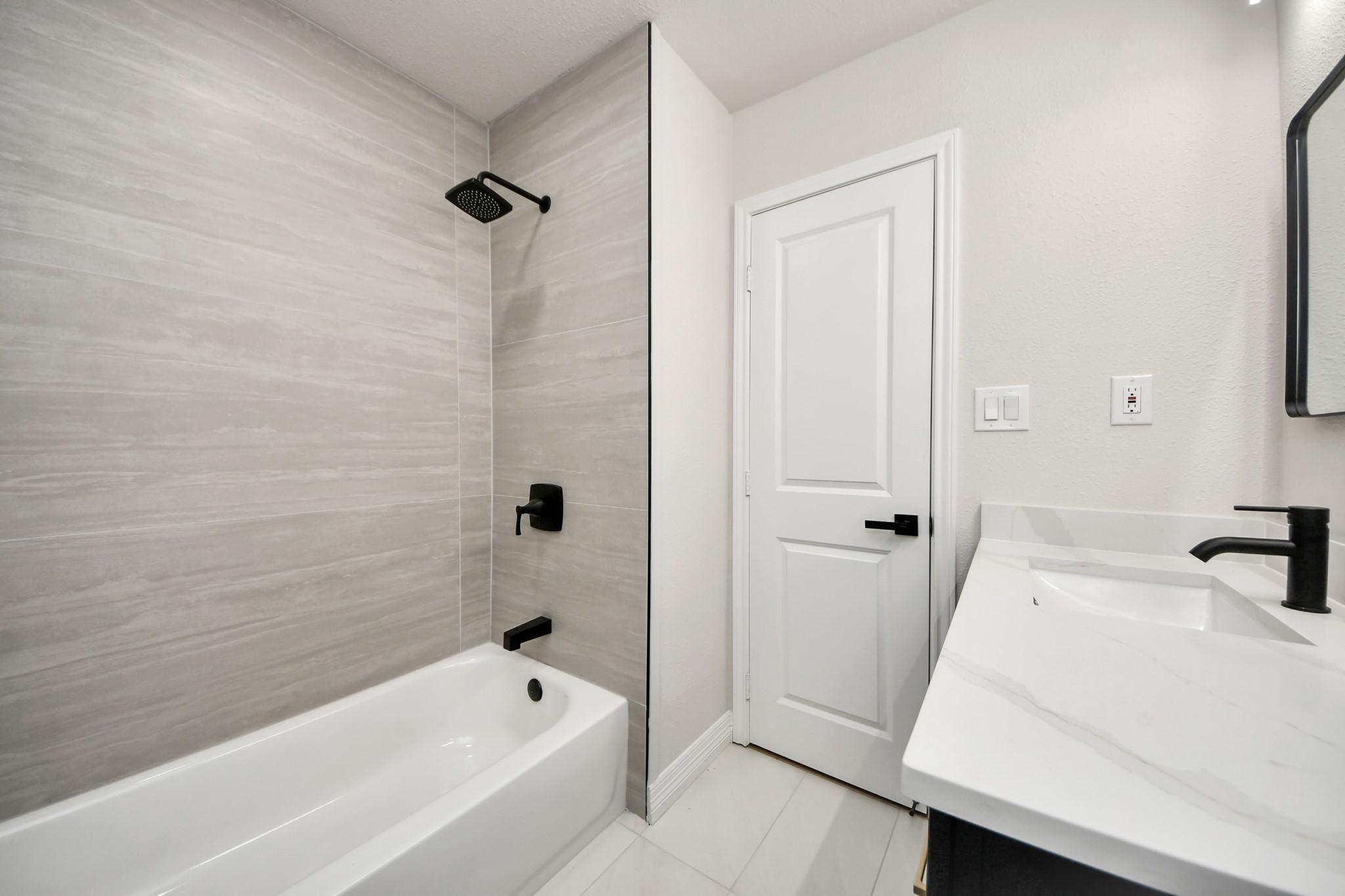 4311 Goldfinch Street Houston, TX 77035 - Photo 34 of 40 a bathroom with a bathtub and a shower