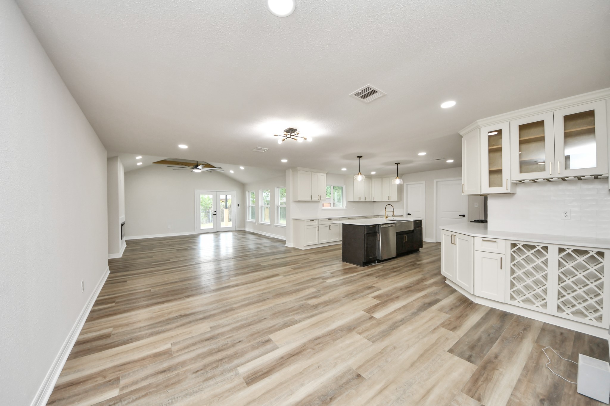 4311 Goldfinch Street Houston, TX 77035 - Photo 9 of 40 a view of kitchen with kitchen island sink and center island