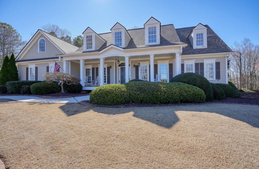 200 Meadow Ridge Court Canton, GA 30115 - Photo 1 of 1 a front view of a house with garden and plants
