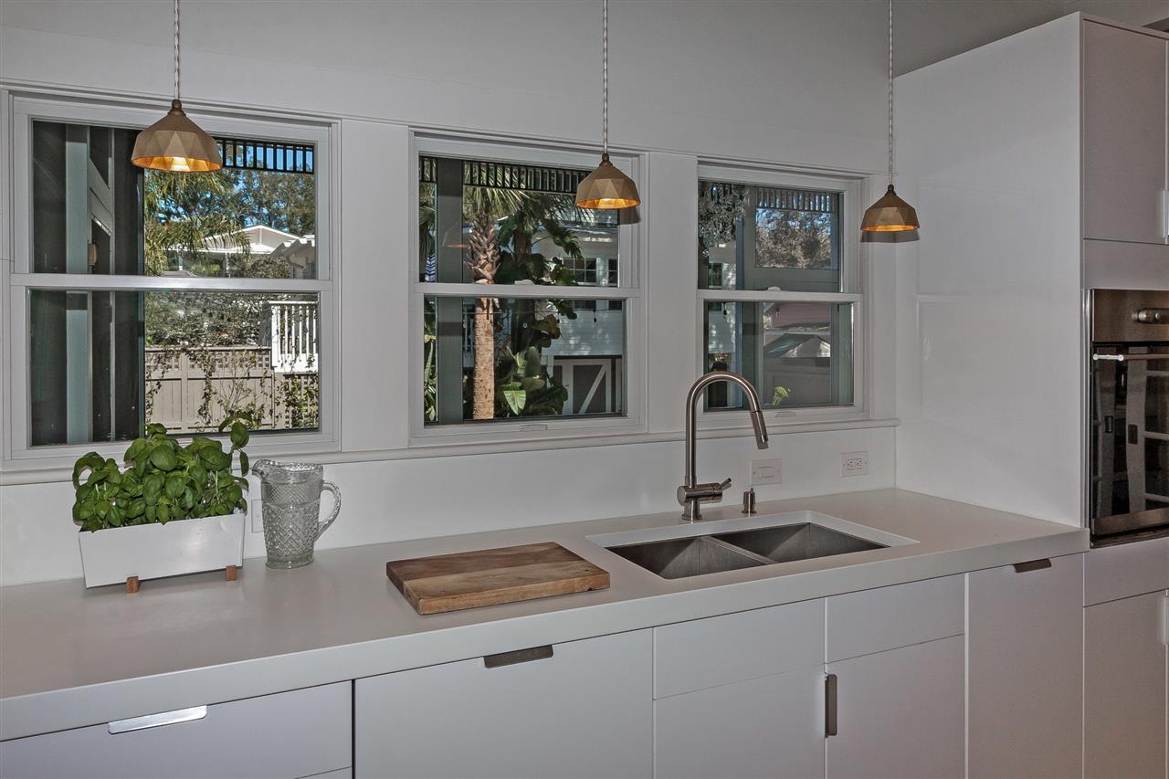 28 Rohde Avenue St. Augustine, FL 32084 - Photo 13 of 48 a bathroom with a sink and a window