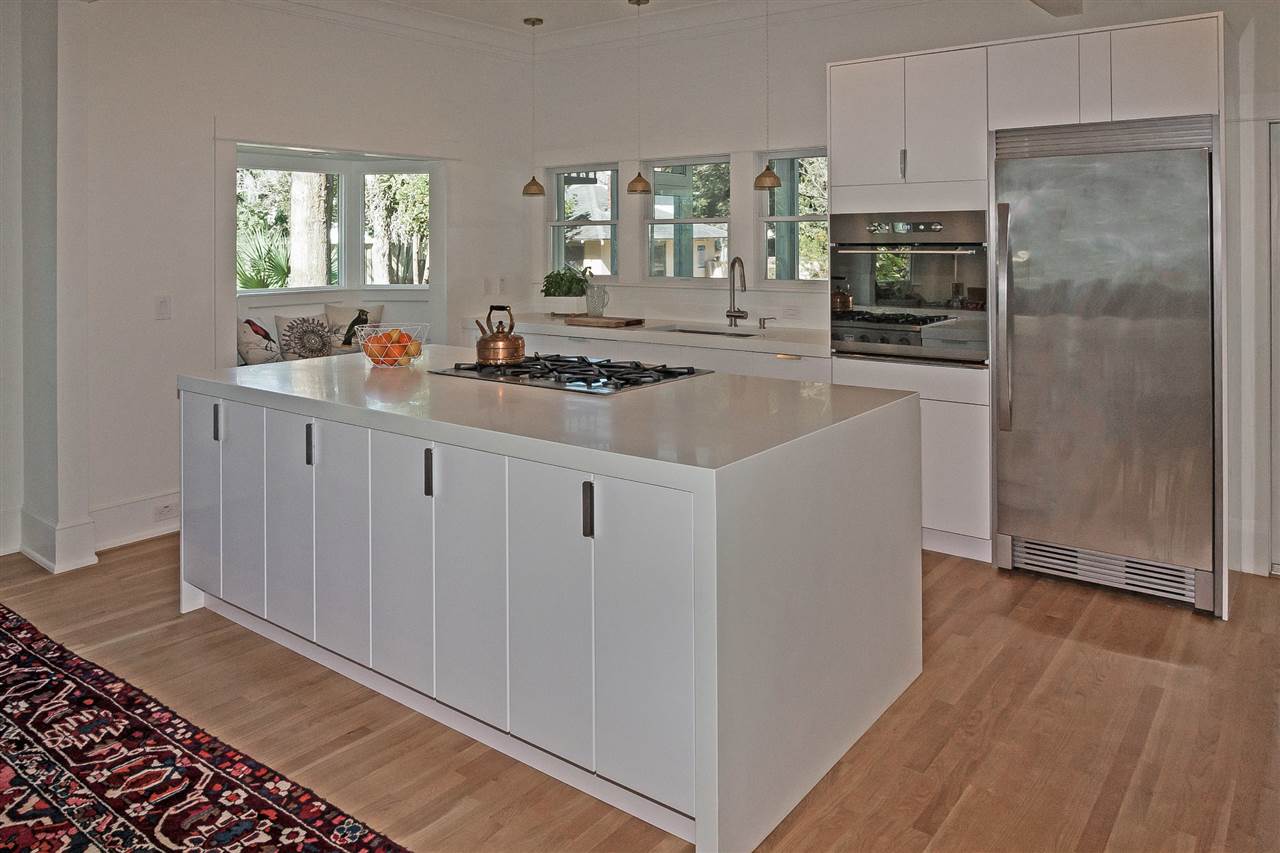 28 Rohde Avenue St. Augustine, FL 32084 - Photo 14 of 48 a kitchen with stainless steel appliances a sink a stove a refrigerator and cabinets