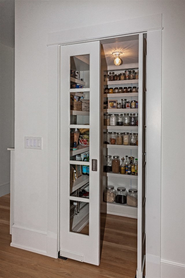 28 Rohde Avenue St. Augustine, FL 32084 - Photo 19 of 48 a room with a wooden floor and shoes