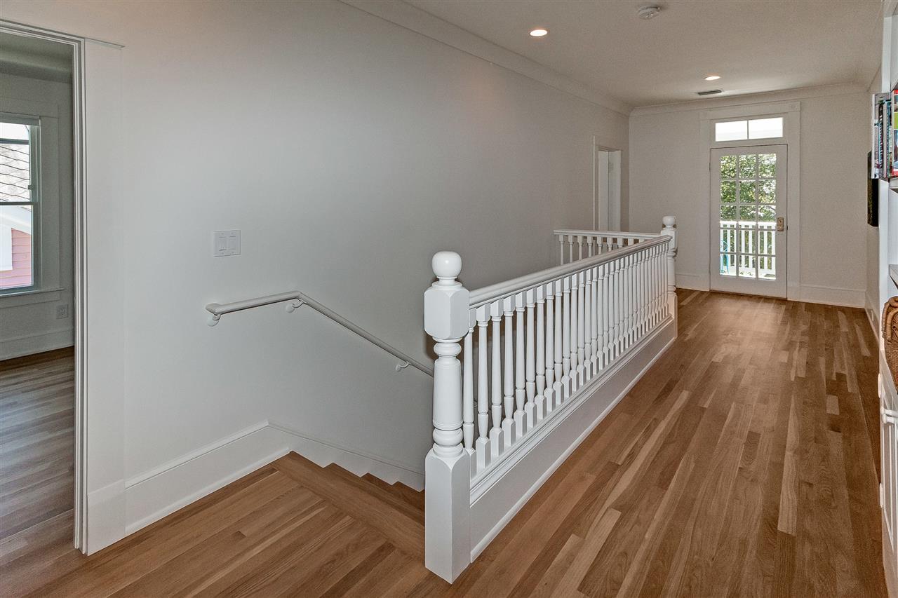 28 Rohde Avenue St. Augustine, FL 32084 - Photo 21 of 48 a view of a room with wooden floor and windows