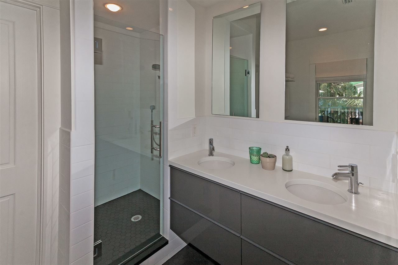 28 Rohde Avenue St. Augustine, FL 32084 - Photo 32 of 48 a bathroom with a sink and a mirror