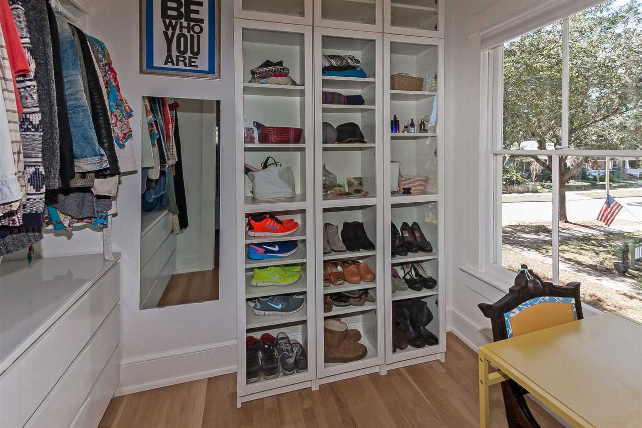 28 Rohde Avenue St. Augustine, FL 32084 - Photo 35 of 48 a view of walk in closet with clothes and shoes