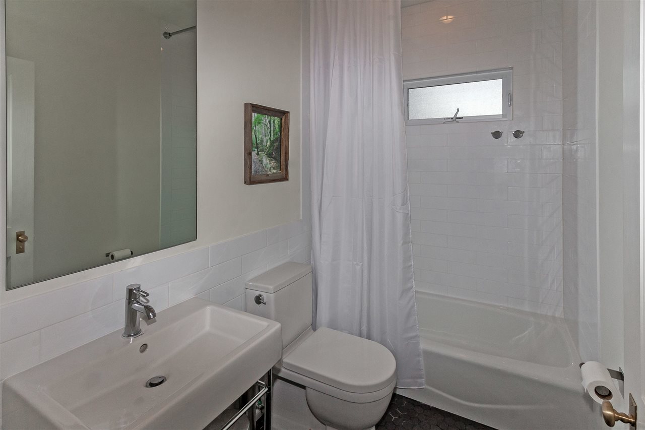 28 Rohde Avenue St. Augustine, FL 32084 - Photo 42 of 48 a bathroom with a sink toilet and shower