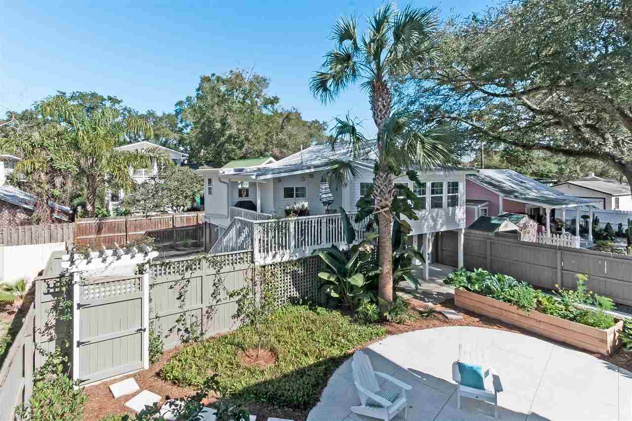 28 Rohde Avenue St. Augustine, FL 32084 - Photo 45 of 48 an aerial view of a house with a yard and potted plants