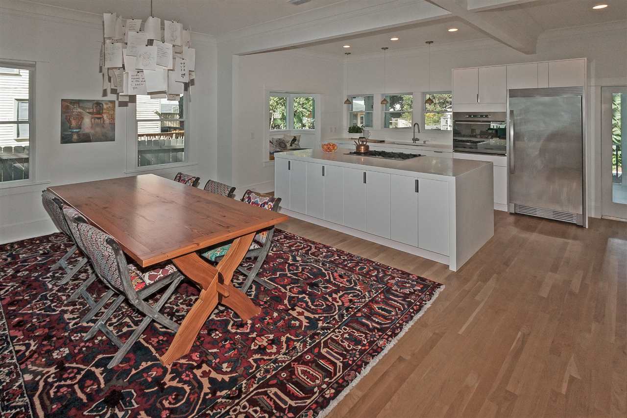 28 Rohde Avenue St. Augustine, FL 32084 - Photo 9 of 48 a kitchen with granite countertop a sink cabinets and stainless steel appliances