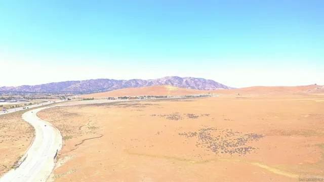 a view of lake and mountain