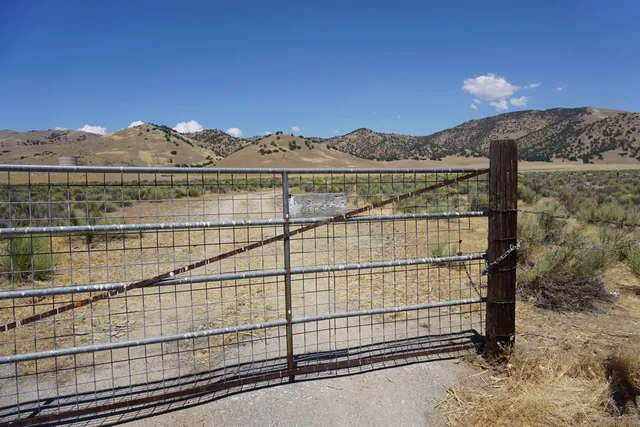 a view of lake with mountain in the background