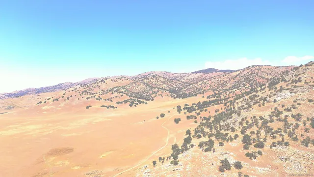 a view of mountain view with mountains in the background