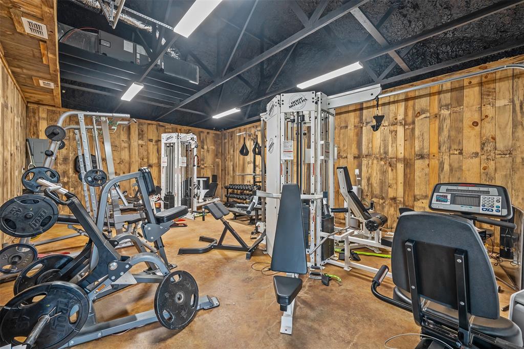 20389 County Road 178 Flint, TX 75762 - Photo 40 of 40 Dedicated fitness space featuring wood paneling