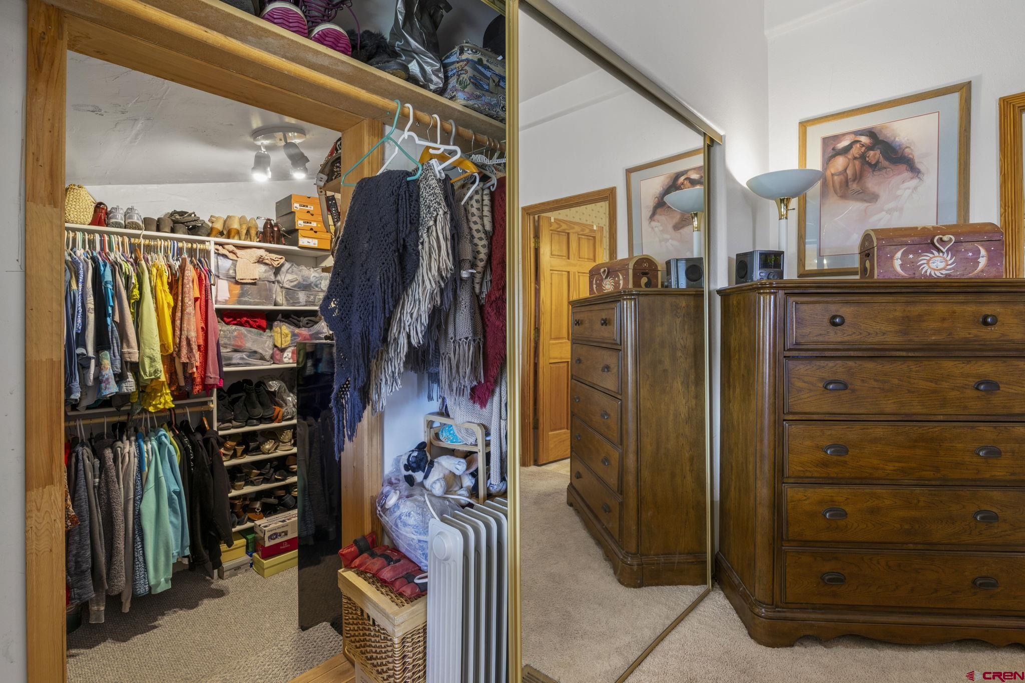 45 Pine Ridge Road Durango, CO 81301 - Photo 23 of 44 a view of walk in closet with clothes