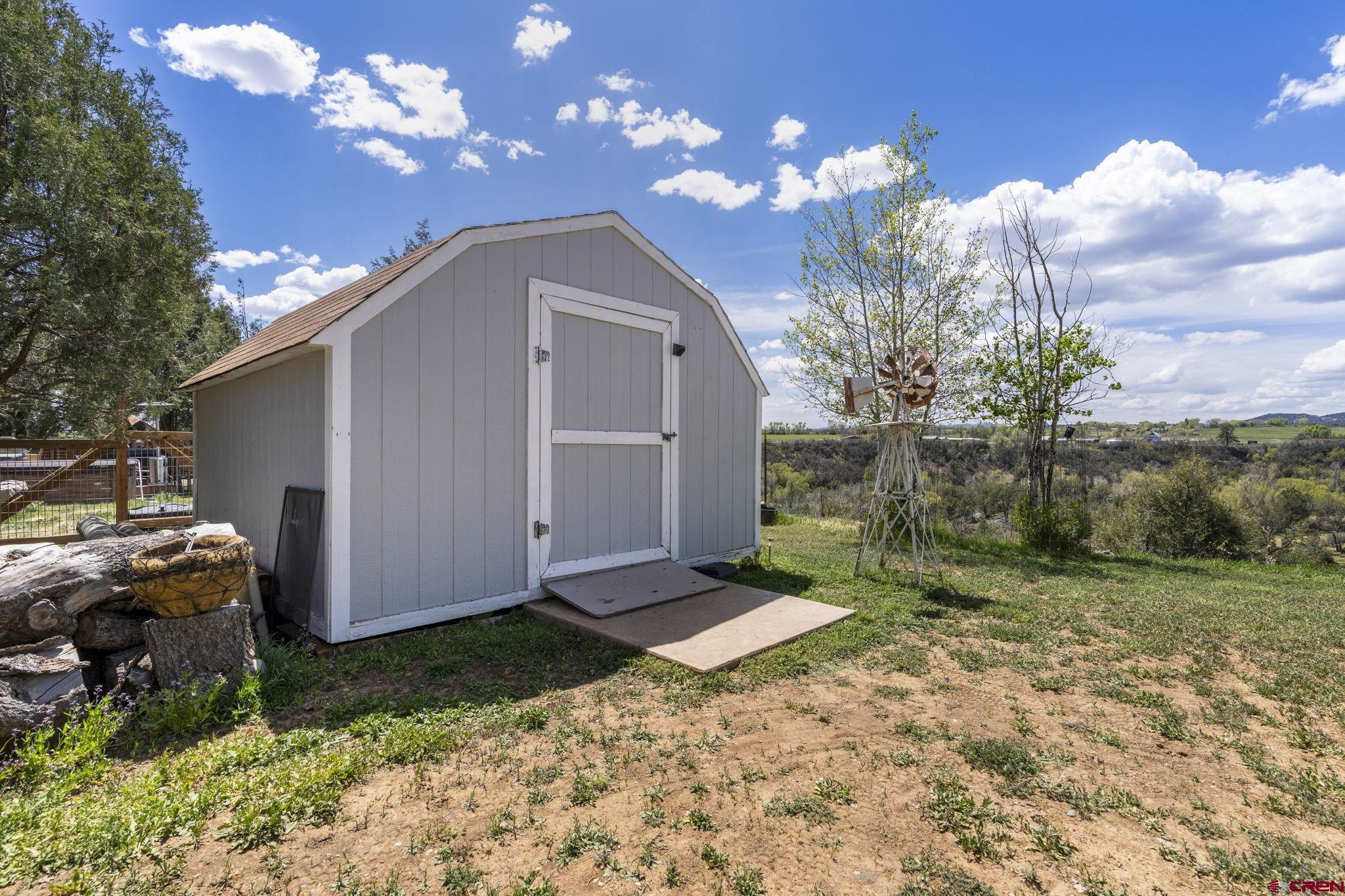 45 Pine Ridge Road Durango, CO 81301 - Photo 35 of 44 a view of a house with a yard