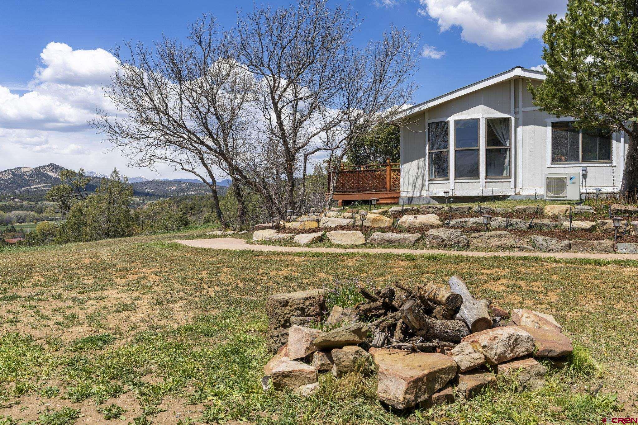 45 Pine Ridge Road Durango, CO 81301 - Photo 39 of 44 a front view of a house with swimming pool
