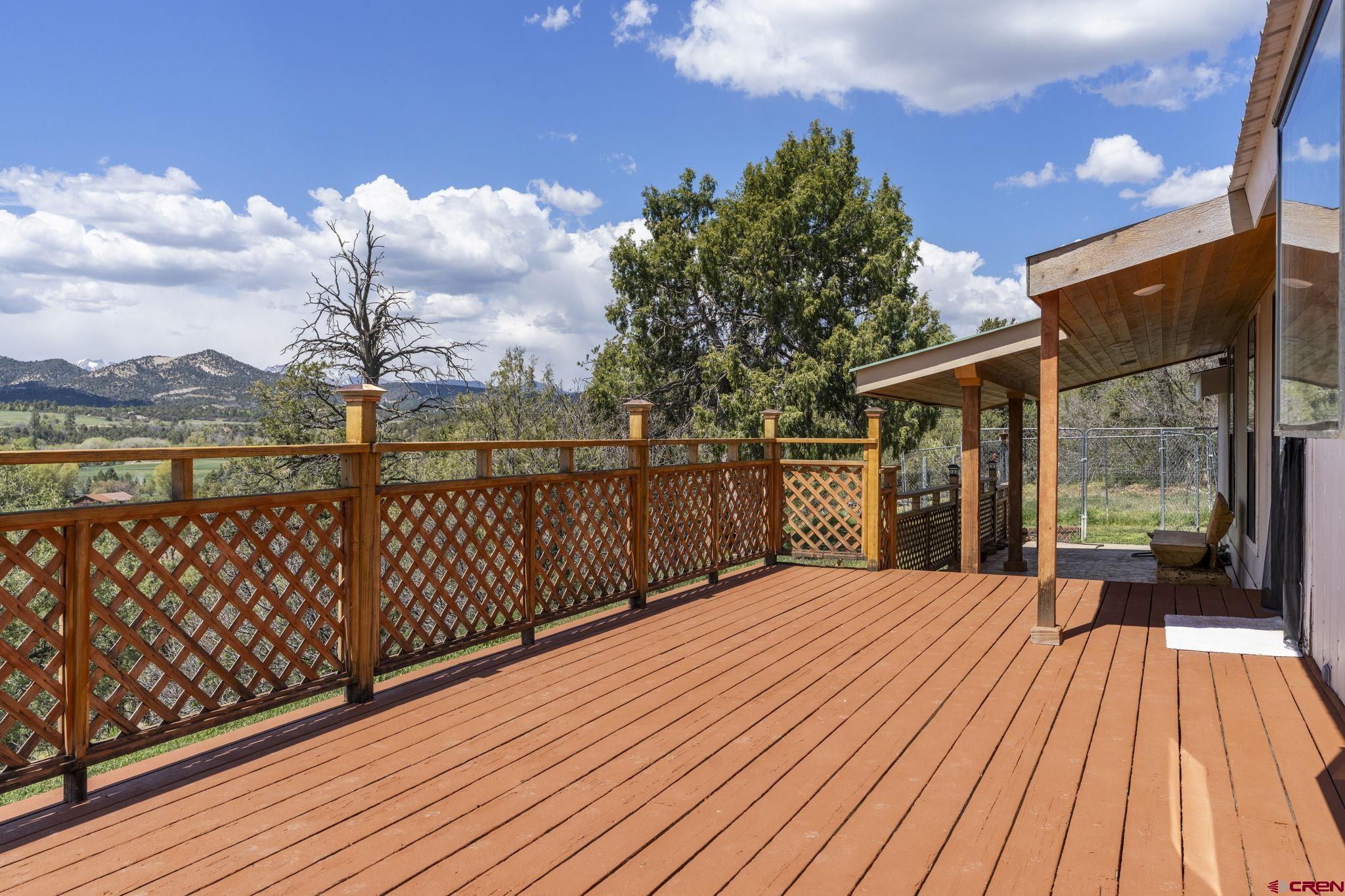 45 Pine Ridge Road Durango, CO 81301 - Photo 4 of 44 a view of balcony with wooden floor and fence
