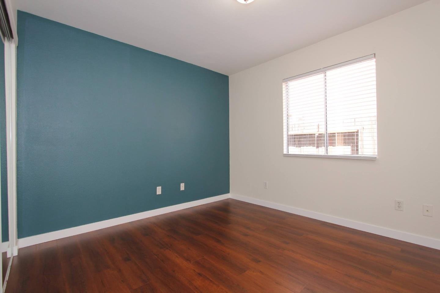 3708 Didcot Circle Sacramento, CA 95838 - Photo 21 of 23 a view of a room with wooden floor and windows