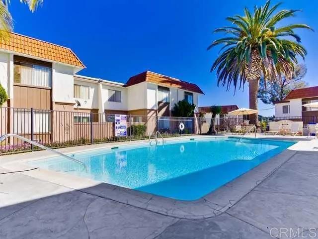10235 Madrid Way, Unit 114 Spring Valley, CA 91977 - Photo 19 of 26 a view of a house with swimming pool and sitting area