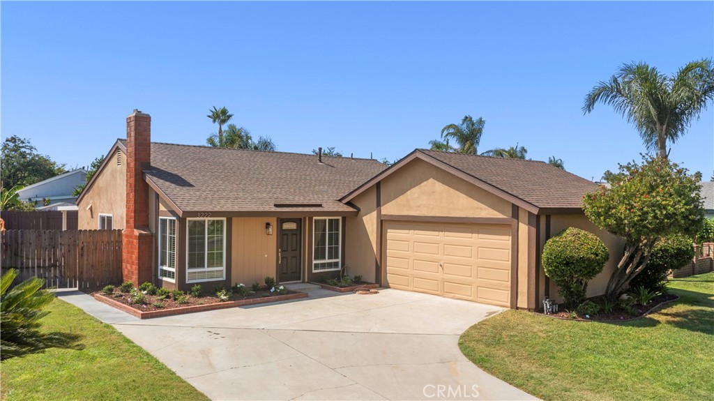 3222 Racine Drive Riverside, CA 92503 - Photo 1 of 1 a view of a house with a yard and potted plants