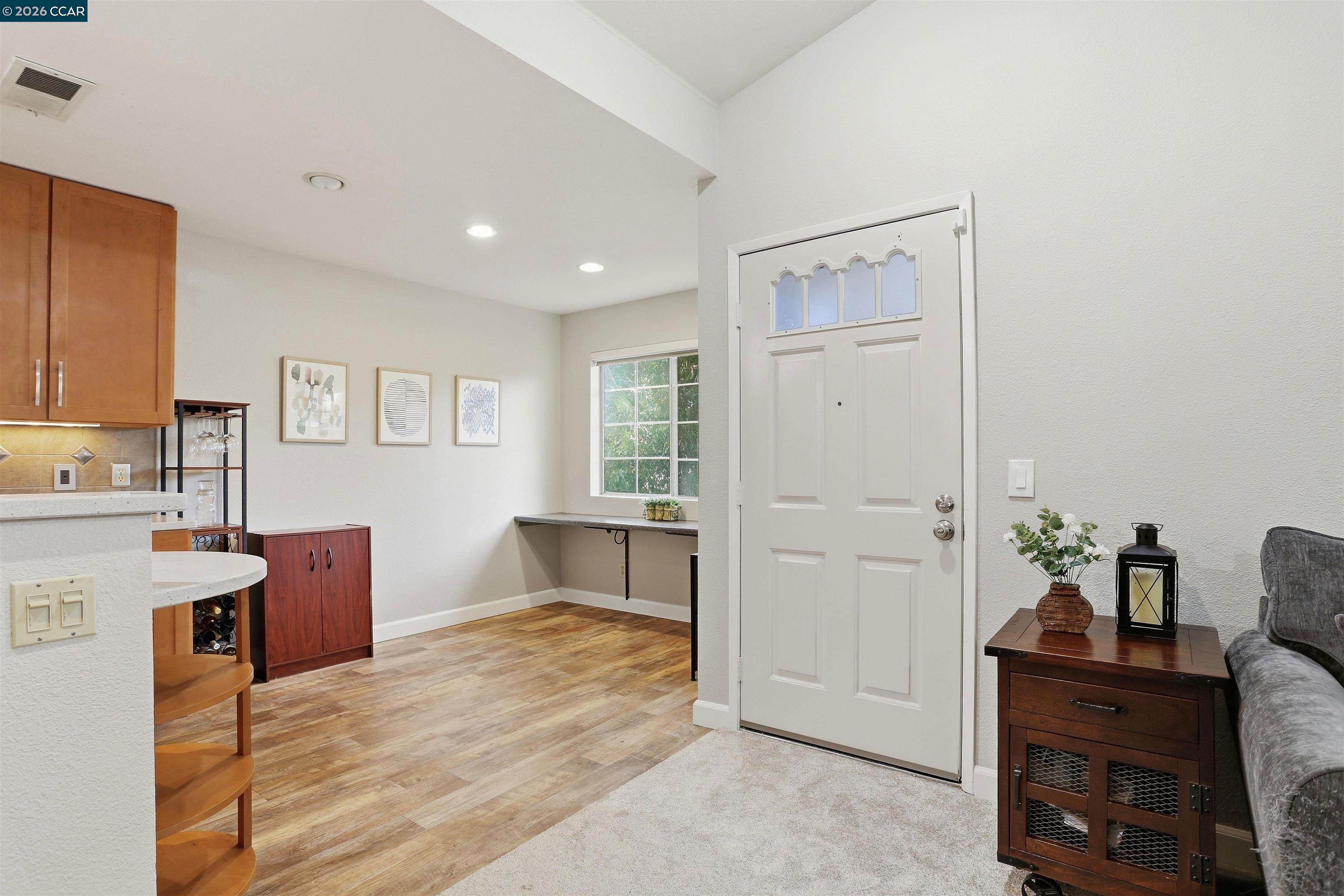 7020 Stagecoach Road, Unit G Dublin, CA 94568 - Photo 3 of 21 a spacious bedroom with a bed and a dresser in it