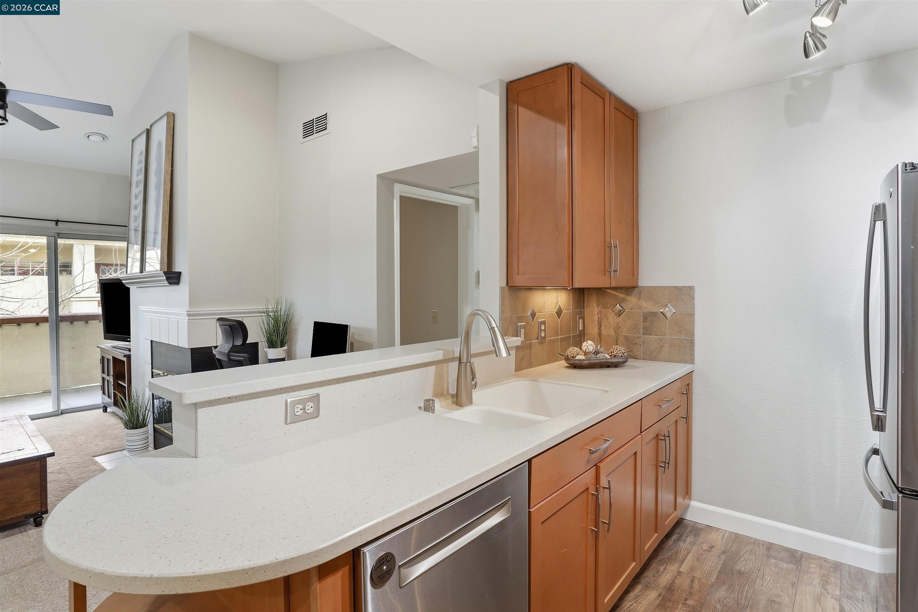 7020 Stagecoach Road, Unit G Dublin, CA 94568 - Photo 9 of 21 a bathroom with a sink double vanity and a mirror