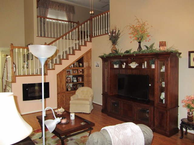 1914 20th Street Huntsville, TX 77340 - Photo 6 of 23 a living room with furniture and a flat screen tv