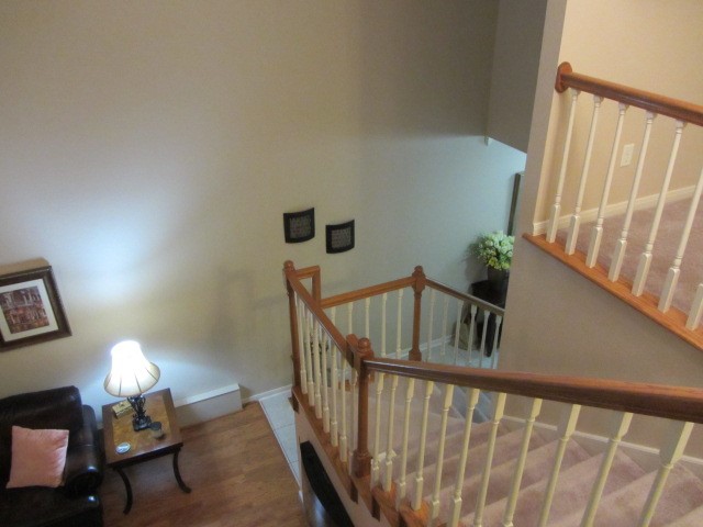 1914 20th Street Huntsville, TX 77340 - Photo 7 of 23 a view of staircase with furniture and a window